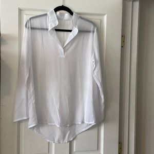 Sheer blouse with pinhole from tag